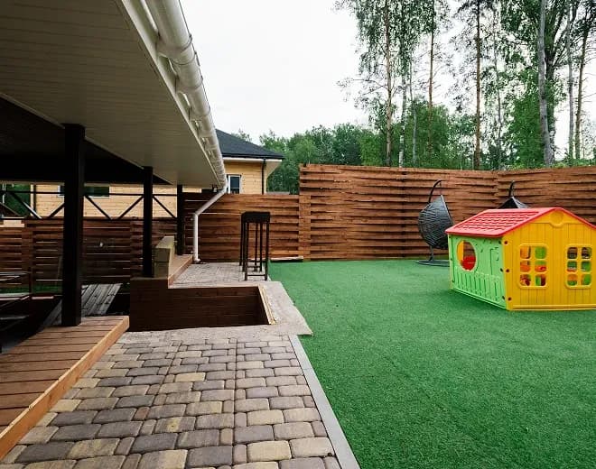 A completed Colorbond fence and gate on a Perth property